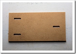 MDF with slotted holes for adjustment